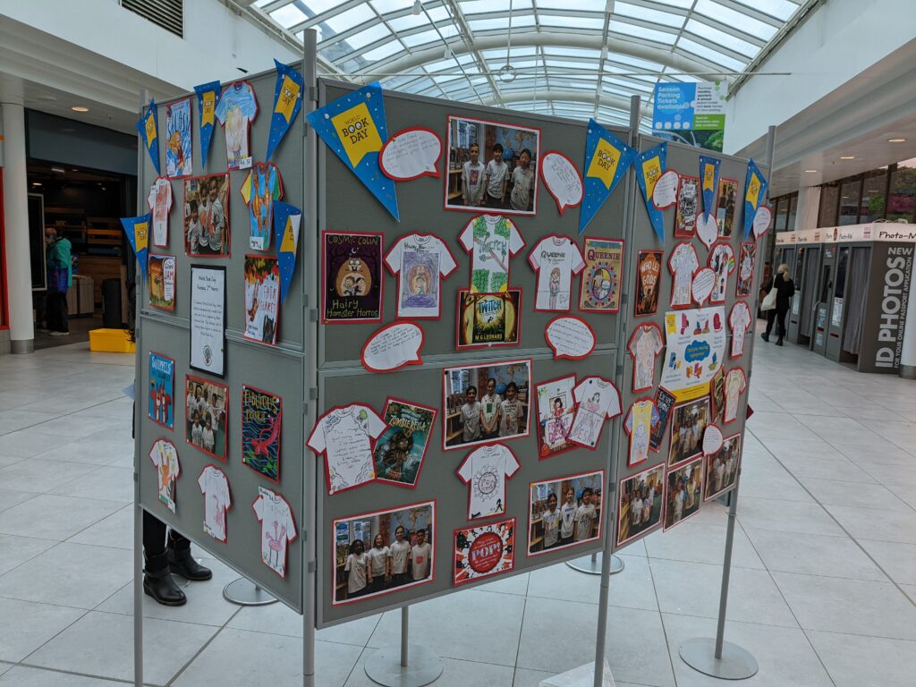 display of t-shirt designs for world book day from local primary school